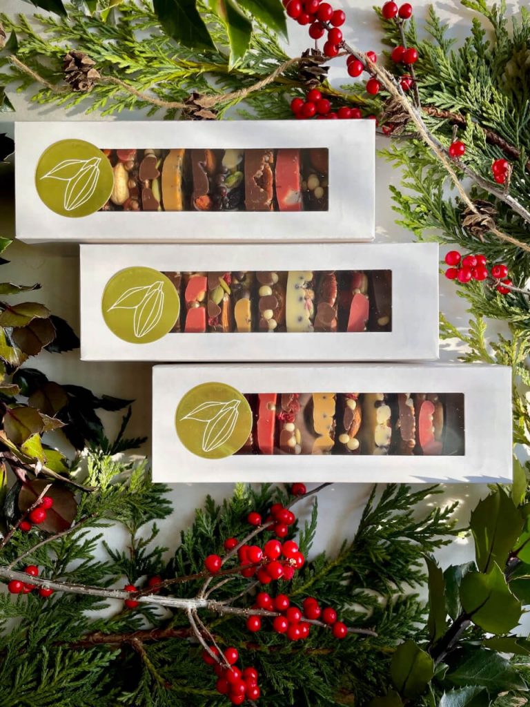 Boxed mendiants framed with cedar leaves
